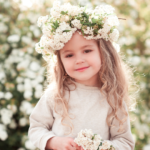 a showing Seasonal Hairstyles with flower for Kids