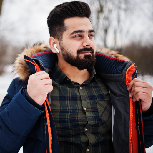 😊 Boy smiling and displaying trendy winter hairstyles for men ❄️